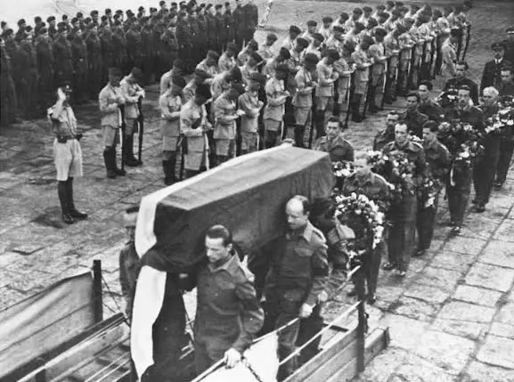 Sikorski's body being carried onto a ship at the Gibraltar Naval Base after his funeral